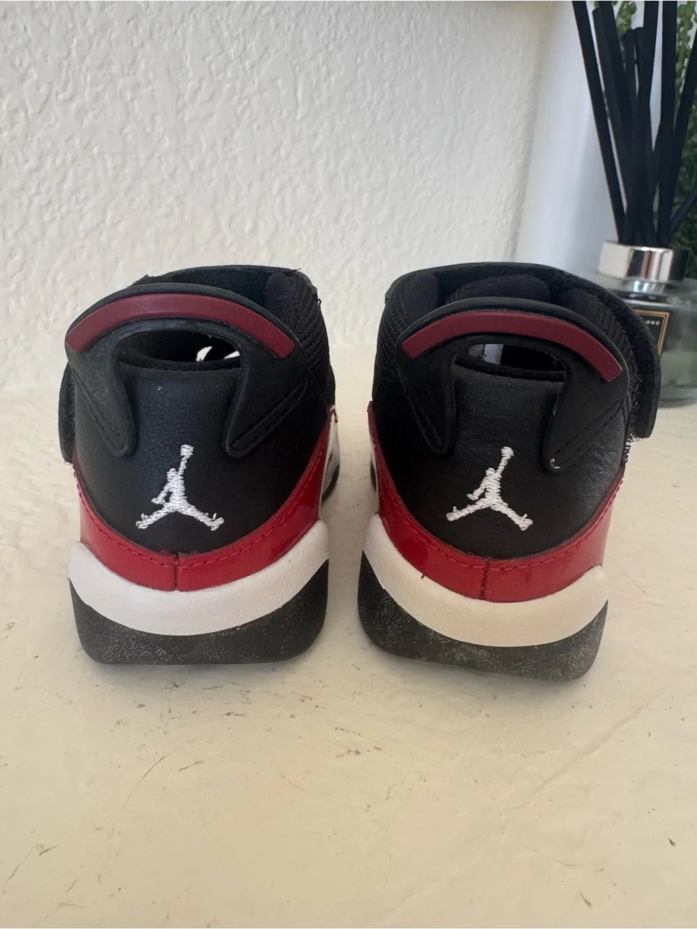 Kids Jordan Black and Red Basketball Sneakers